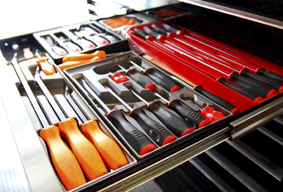 Hand tools in a shop drawer